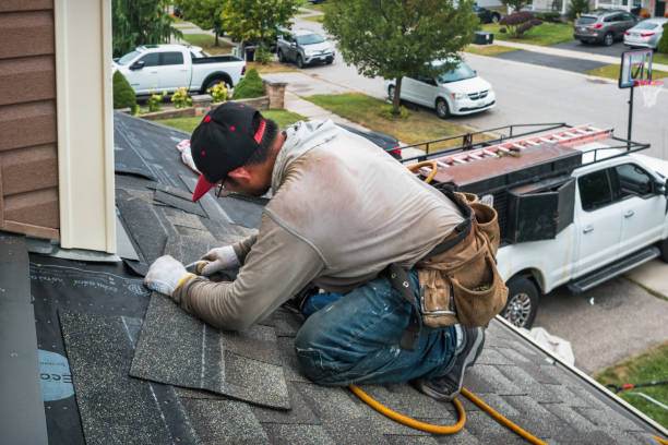 Professional Roofing technician working in Island Park, ID